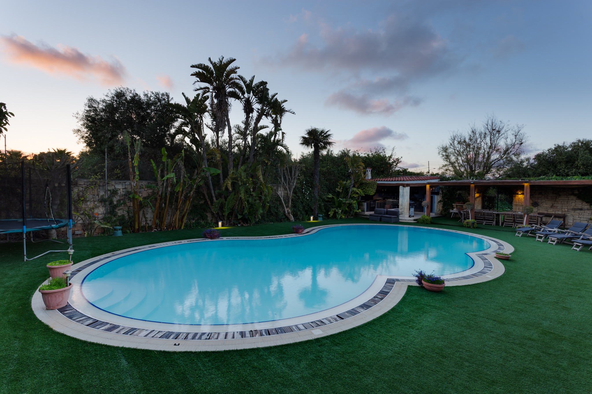 Manicured lawn with fountain at Nine Angels Villa event venue